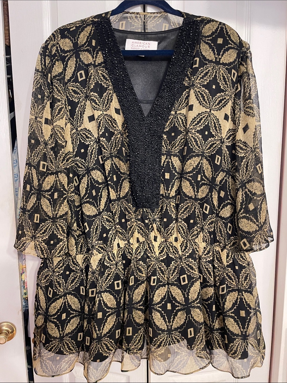 Badgley Mischka 3X Black and Gold Top with Embellished Neck &
Drop Waist